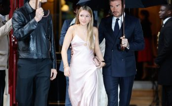 Harper Beckham, 13, follows in her mum’s stylish footsteps in a pink satin gown while Brooklyn twins with wife Nicola as they join dad David, brother Cruz and his girlfriend Jackie Apostel at Victoria’s Paris show