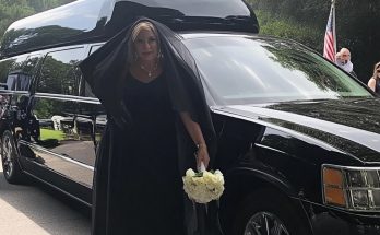 MY MIL BROUGHT A "SPECIAL GIFT" IN A HEARSE TO OUR WEDDING CEREMONY I was standing hand in hand with my fiancé, Ben, exchanging our wedding vows when suddenly, we heard a loud honk, cutting through the silence. Heads turned, whispers echoed, and then, we saw it. Rolling up the gravel path, loud and unmistakable, was a massive black hearse, with NONE OTHER THAN MY MOTHER-IN-LAW, Linda, behind the wheel. She looked more like she was on her way to a funeral than her only son's wedding. The hearse finally stopped. The doors creaked open, and Linda stepped out. She glanced at me, then at Ben, and let out a long, exaggerated sigh. "I just want you to know," she announced loudly, "that this IS THE WORST DAY OF MY LIFE." She dabbed her eyes with a lace handkerchief as if this was some kind of tragic event. Linda turned to the crowd and dramatically raised her hands. "But I did bring a "GIFT" for the occasion. It's in the back of the hearse. Come here! YOU'LL WANT TO SEE IT." As she opened the back of the hearse, guests couldn't withhold their gasps. ⬇️