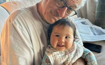 Robert De Niro, 80, and baby daughter Gia, 10 months, snuggle in rare family photo