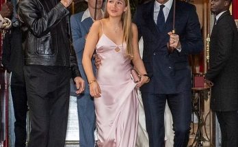 Harper Beckham, 13, follows in her mum’s stylish footsteps in a pink satin gown while Brooklyn twins with wife Nicola as they join dad David, brother Cruz and his girlfriend Jackie Apostel at Victoria’s Paris show