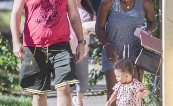 Serena Williams and husband Alexis Ohanian fawn over adorable daughter Olympia, one, as she toddles down the sidewalk during casual stroll in Melbourne