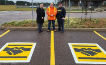 Here’s what a handshake symbol on a parking space means